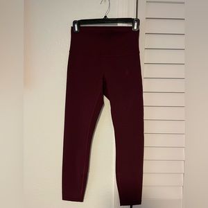 Lululemon Wunder Train High Rise Tight 25” in Red Merlot